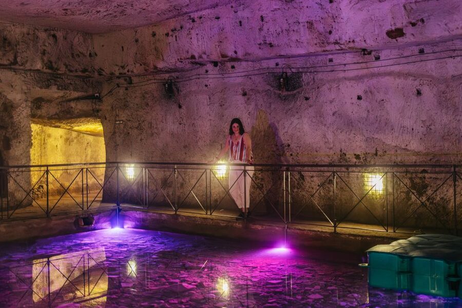 Naples: The Bourbon Tunnel Guided Tour with Entrance Ticket - Cars, motorcycles, and fascist-era statues