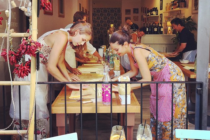 Orecchiette Cooking Class and Wine Pairing in Lecce - A central Lecce venue with food on the table
