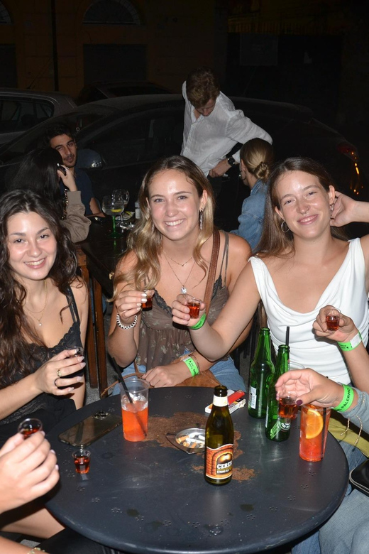 Palermo: Guided Bar Crawl with Shots and Discounts on Drinks - Walking through Palermo after dark