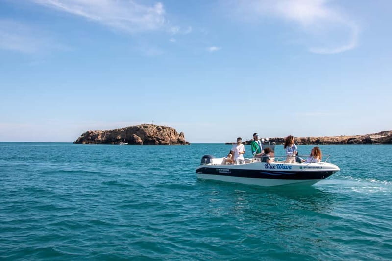 Polignano a Mare: Boat Tour with Prosecco and Snacks - Prosecco, taralli, and the ride back