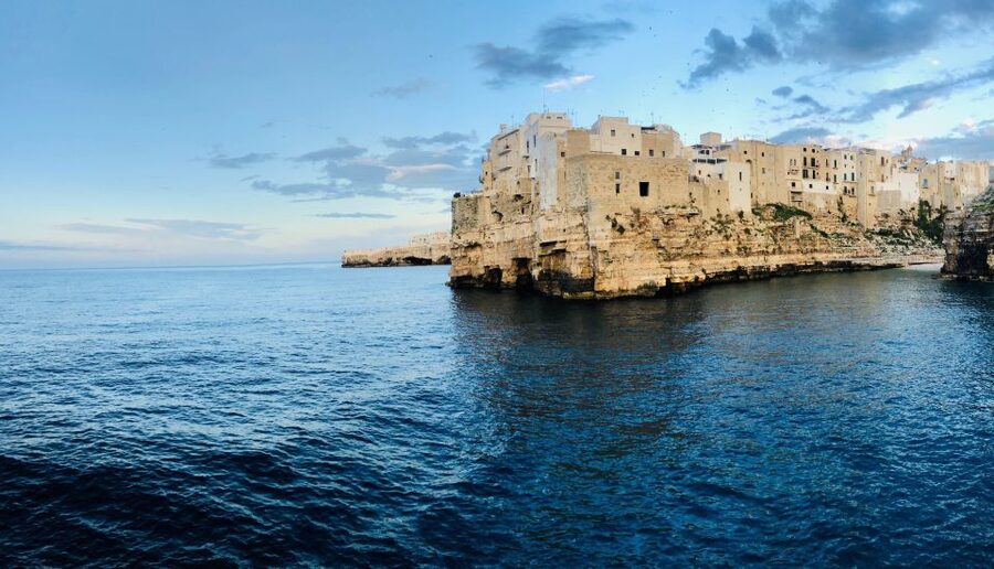 Polignano a Mare: Boat Trip, Swim & Cave with Aperitif - Leaving the harbor and seeing the famous town sights