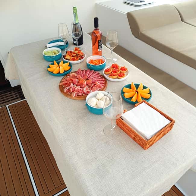 Polignano a Mare: Catamaran Tour with Aperitif & Local Food - Seeing Polignano a Mare from below the cliffs
