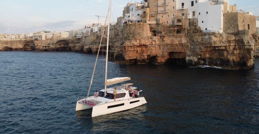 Polignano a Mare: Catamaran Tour with Aperitif & Local Food - Lama Monachile and the famous Bourbon bridge