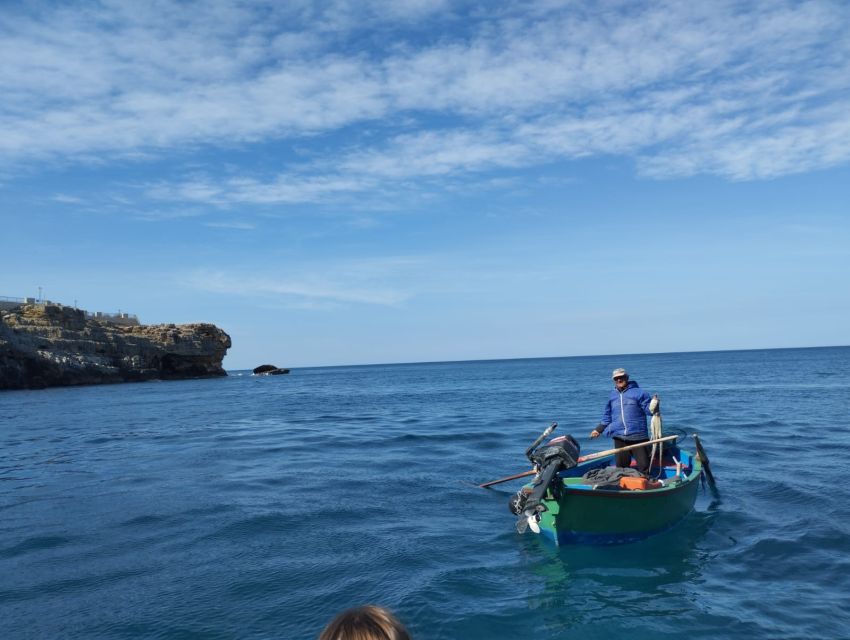 Polignano a Mare: Speedboat Cruise to Caves with Aperitif - Entering Grotta Palazzese and the coastal caves