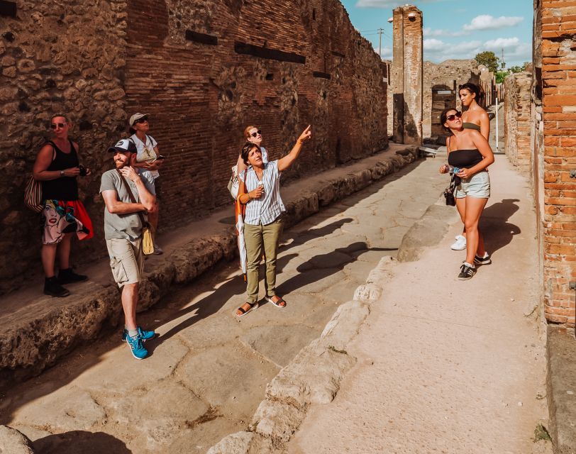 Pompeii: Entry Ticket and Guided Tour with an Archaeologist - Lupanar, shops, and the less polished side of Pompeii