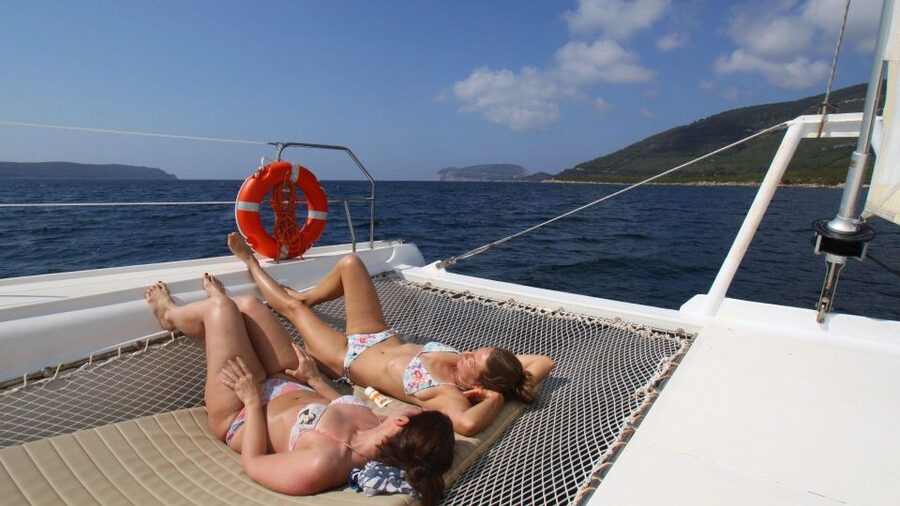 Porto Conte: Half-day catamaran tour with aperitif - Booking details that matter