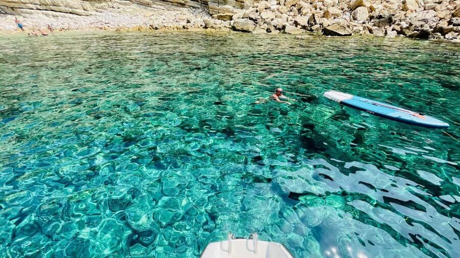 Porto Conte: Half-day catamaran tour with aperitif - Morning or afternoon departure?