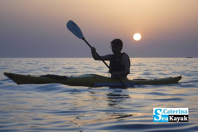 Porto Selvaggio kayak tour + cliff diving + cold spring immersion - Paddling below the Tower of S. Maria dell’Alto