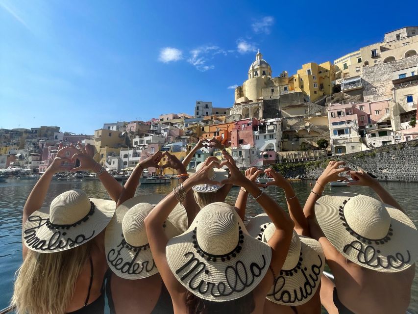 Procida: Boat Tour with Swimming Stops and Underwater Photos - Two swimming stops with masks and fish cards