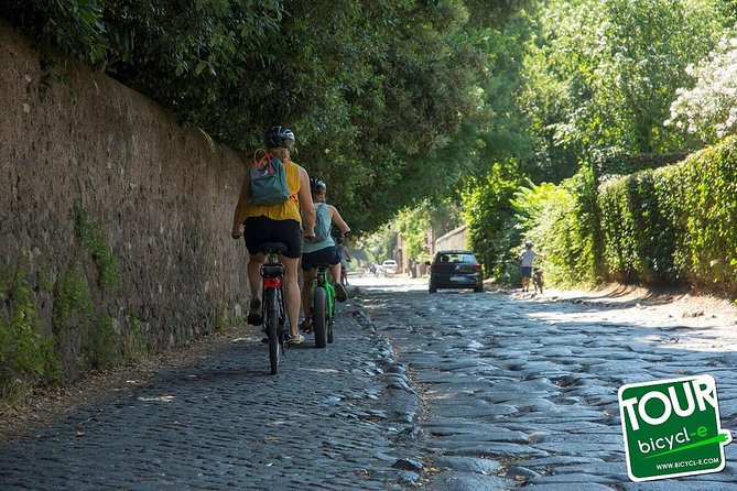 Rome:Appian Way E-bike Tour, Catacombs, Aqueducts & Transfer - Riding the ancient Appian paving