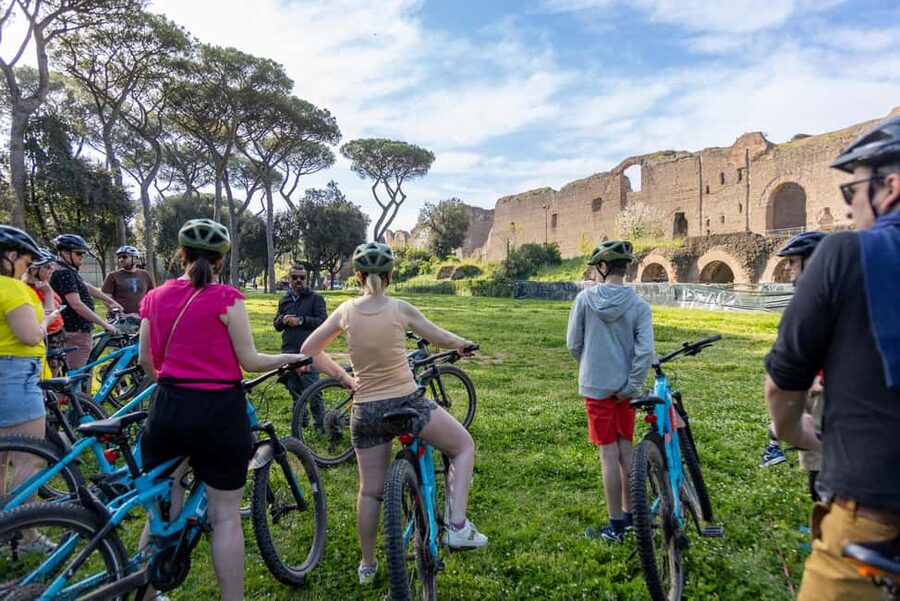 Rome:Appian Way E-bike Tour with Catacombs, Aqueducts & Food - Riding the Appian Way past Roman ruins