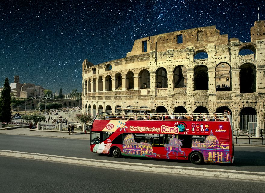 Rome: City Highlights Open-Top Bus Night Tour - The Colosseum is the night’s main photograph