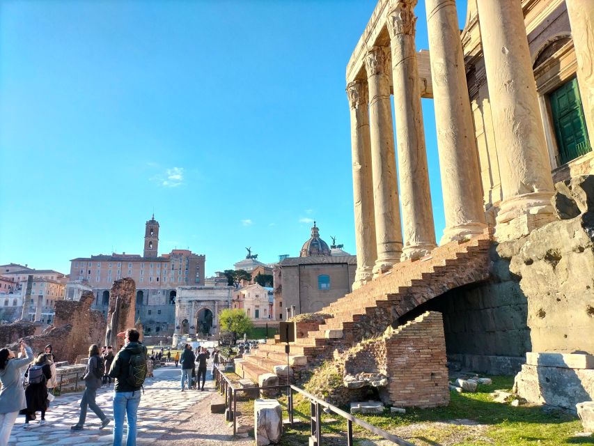 Rome: Colosseum and Ancient Rome Guided Walking Tour - Walking through the Roman Forum