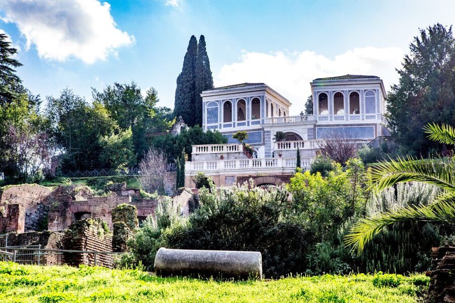 Rome: Colosseum Arena Access and Ancient Rome Guided Tour - Walking through the Roman Forum