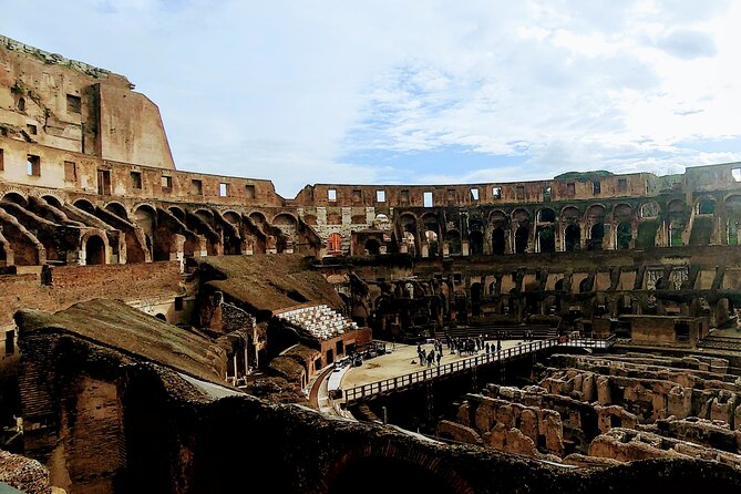 Rome: Colosseum Guided Tour with Roman Forum and Palatine hill - Following the Arch of Titus to the Roman Forum