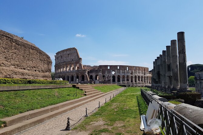 Rome: Colosseum, Palatine Hill and Roman Forum Guided Tour - Walking the Via Sacra toward Palatine Hill