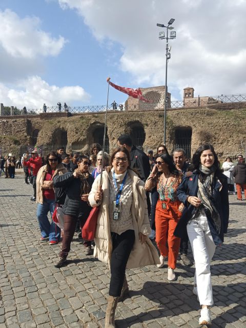 Rome: Colosseum, Palatine Hill, & Roman Forum Walking Tour - Entering the Colosseum on levels one and two