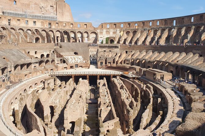 Rome: Colosseum, Roman Forum & Palatine Hill Experience - Walking the Roman Forum