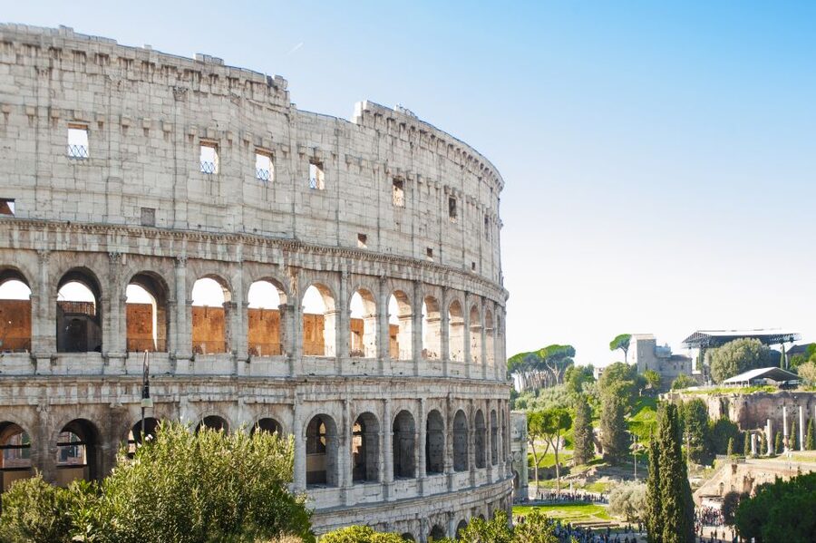 Rome: Colosseum, Roman Forum & Palatine Hill Tour - Entering the Colosseum after security