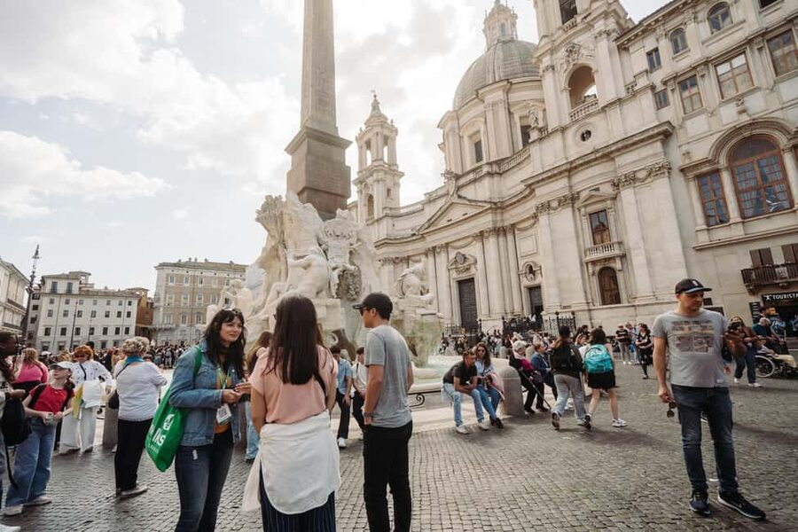 Rome: Colosseum, Vatican Museums & Historic Center in a Day - Entering the Colosseum with an official operator