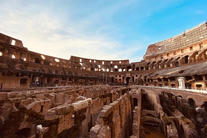 Rome: Colosseum with Arena, Roman Forum and Palatine Guided Tour - Entering the Colosseum through the arena