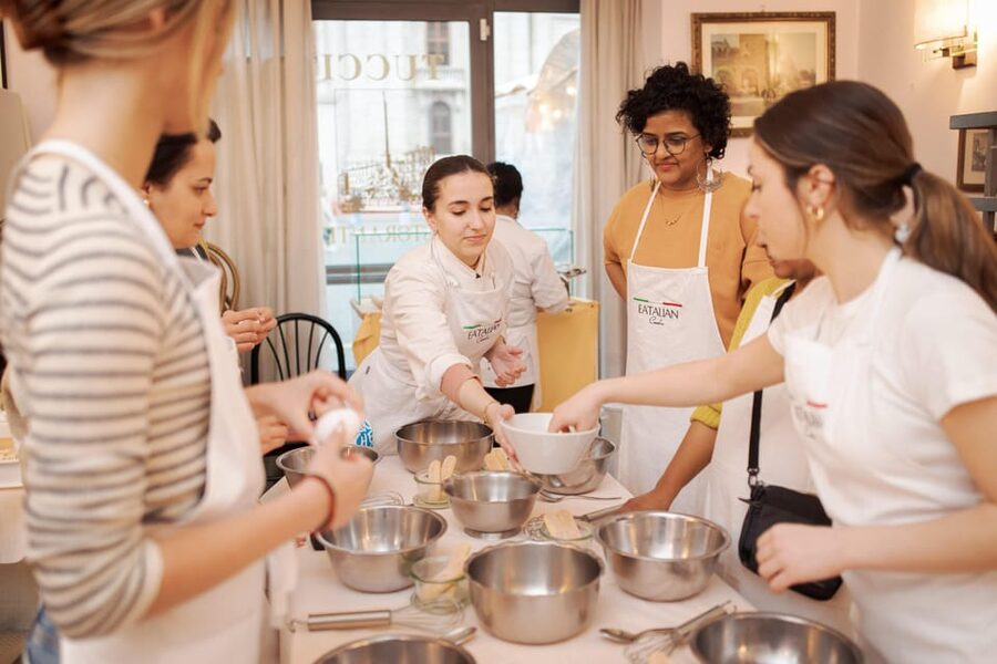 Rome: Pasta and Tiramisu Cooking Class in Piazza Navona - Making tiramisu before sitting down to eat