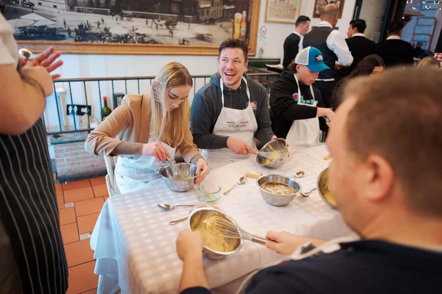 Rome: Pizza and Tiramisu Cooking Class in Piazza Navona - What the instructors add to the evening