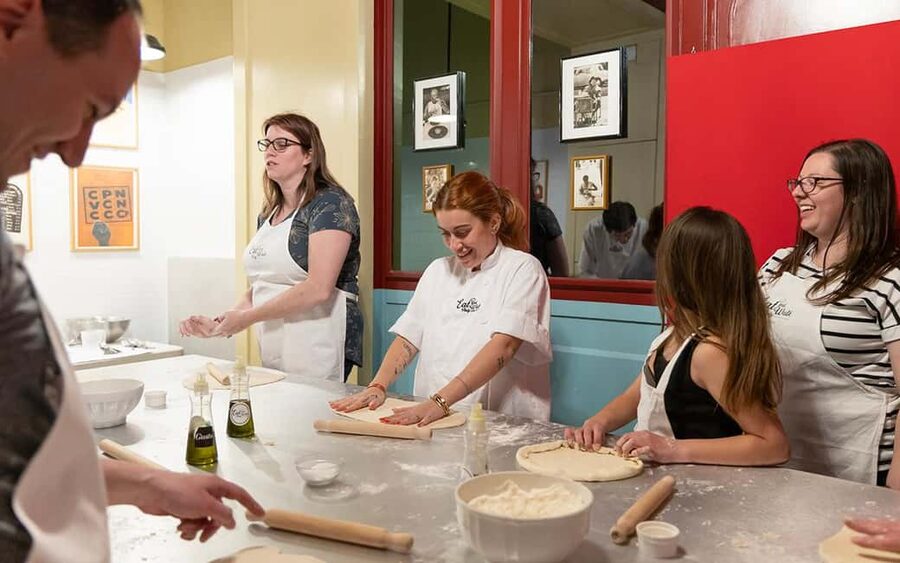 Rome: Pizza & Tiramisu Making Class with Wine & Limoncello - Kneading, stretching, and topping your pizza