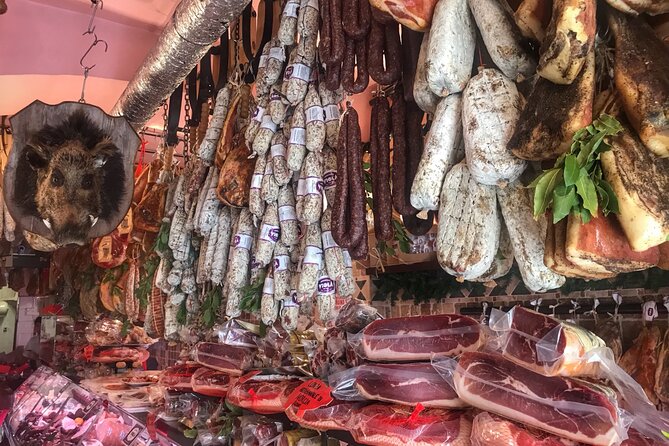 Rome Street Food Tour with Local Guide - Portico of Octavia and ancient Rome between bites