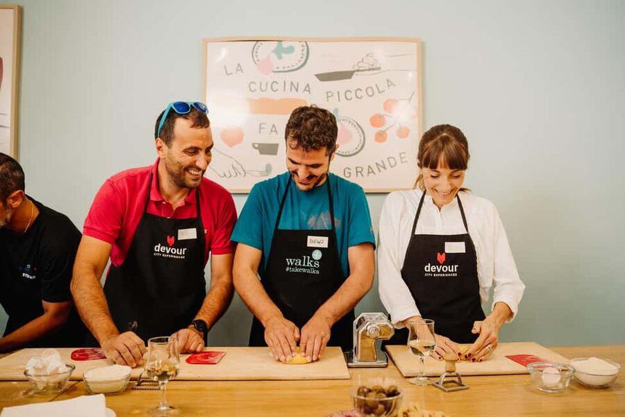 Rome: Traditional Pasta Making Class with Wine & Gelato - Sitting down to eat your own work