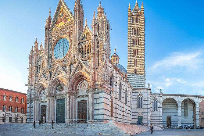 Skip the Line: Siena Duomo and City Walking Tour - Palazzo Chigi Saracini and the route through old Siena