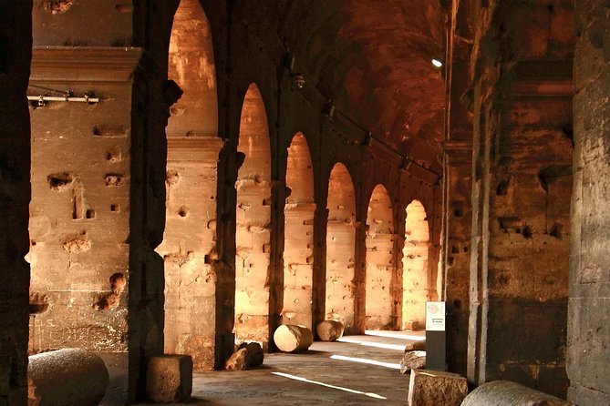 Small Group Colosseum, Roman Forum & Palatine Hill Tour - Entering the Colosseum with a guide