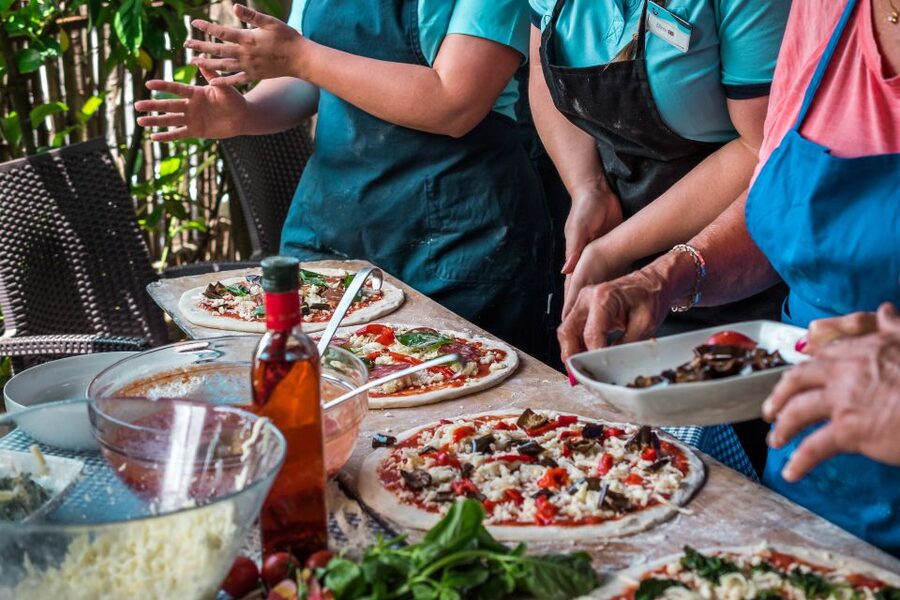 Sorrento: Pizza Making Class at Tirabusciò Cooking School - Choosing toppings and using the pizza oven
