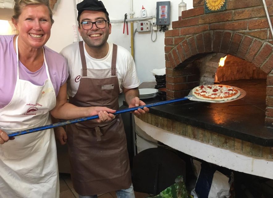 Taormina: Half-Day Pizza Making Class - Stretching the dough and choosing toppings