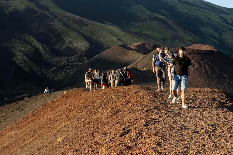 Taormina: Mount Etna Sunset Tour with Cave Visit and Tasting - The tasting stop: honey, wine, and Sicilian produce