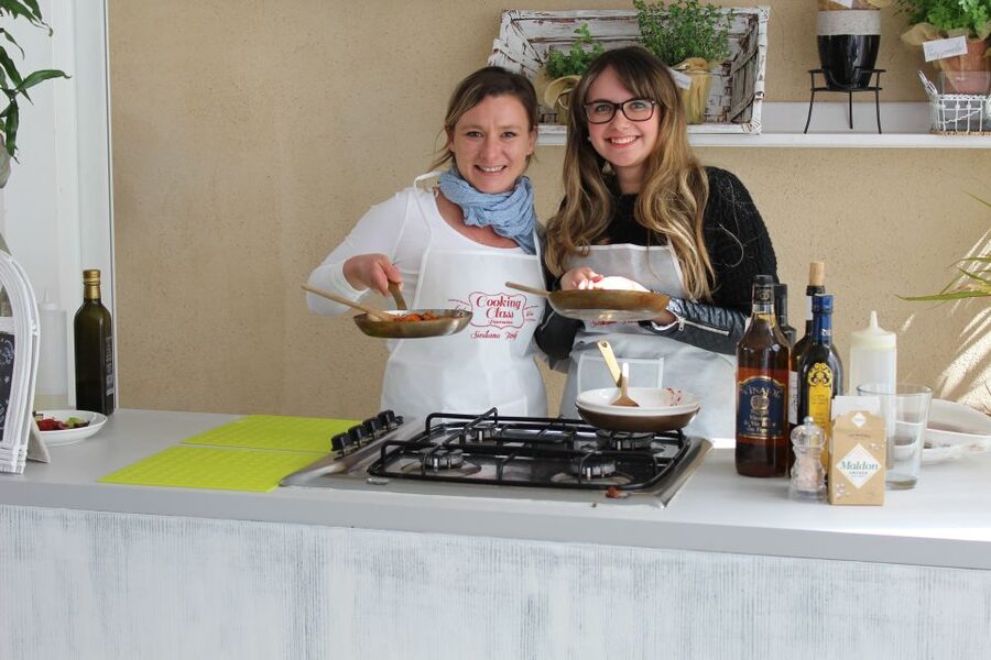 Taormina: Sicilian Cooking Class & Market Tour - Sitting down to eat the food you prepared