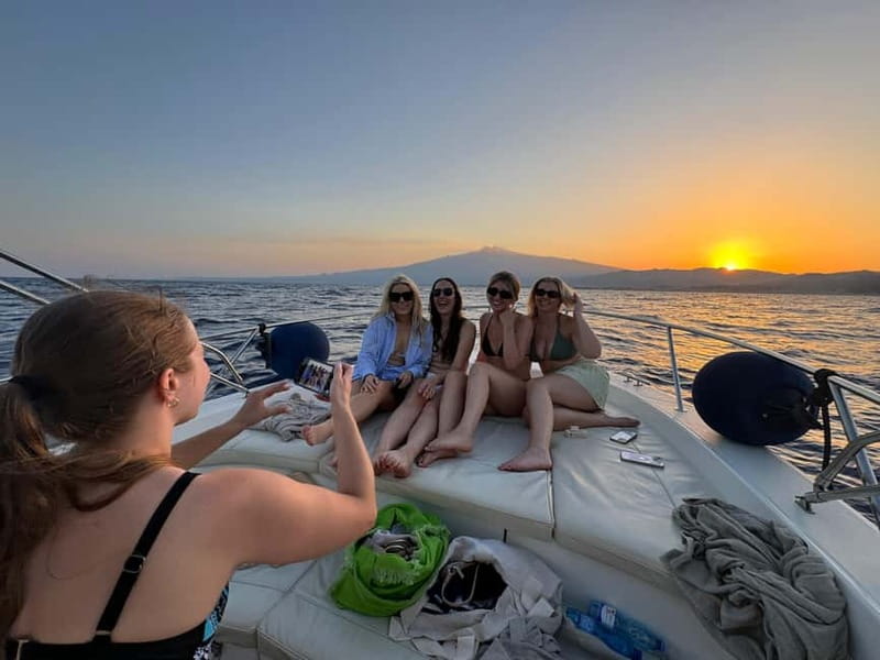 Taormina: Sunset Boat Tour with Dolphin Watching & Aperitif - Cruising past the caves and bays