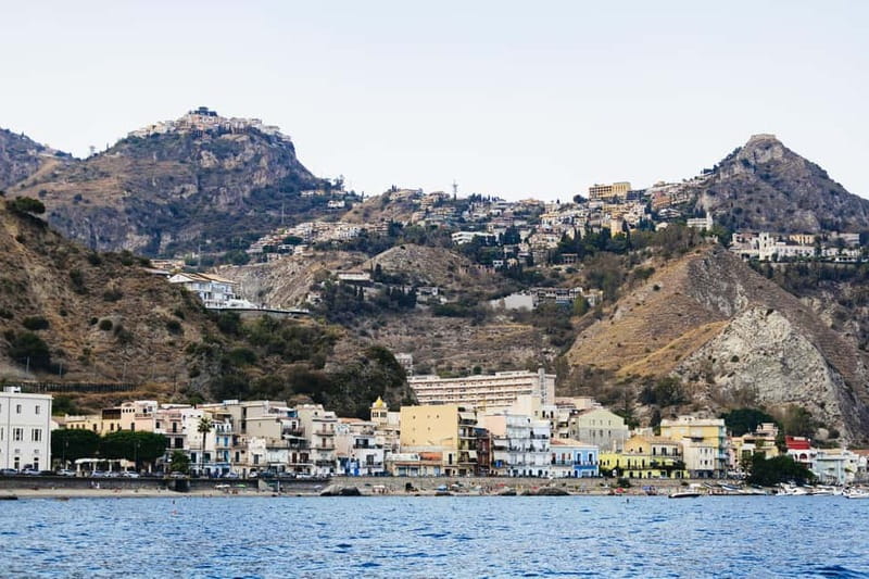 Taormina: Sunset Boat Tour with Dolphin Watching & Aperitif - Looking for bottlenose dolphins near Taormina