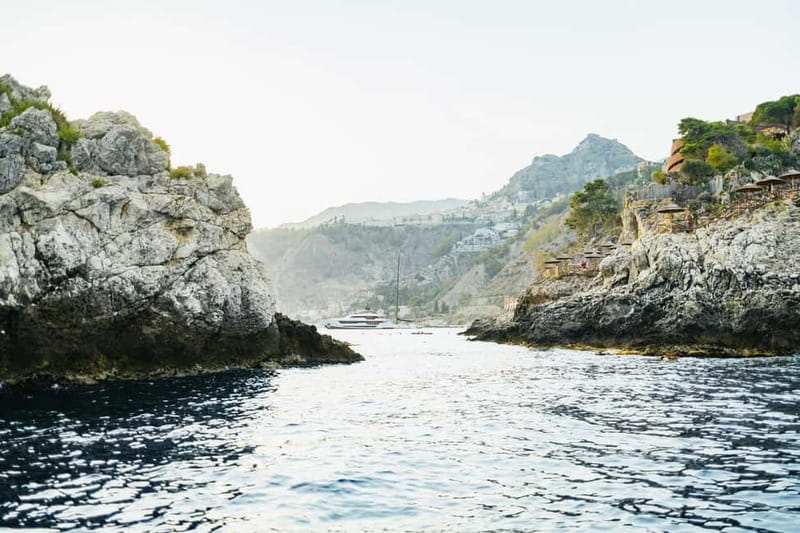 Taormina: Sunset Boat Tour with Dolphin Watching & Aperitif - The Blue Diamond, food, and the feel on board