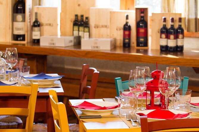 Tuscan Cooking Class and Dinner in Florence - Sitting down for dinner with wine