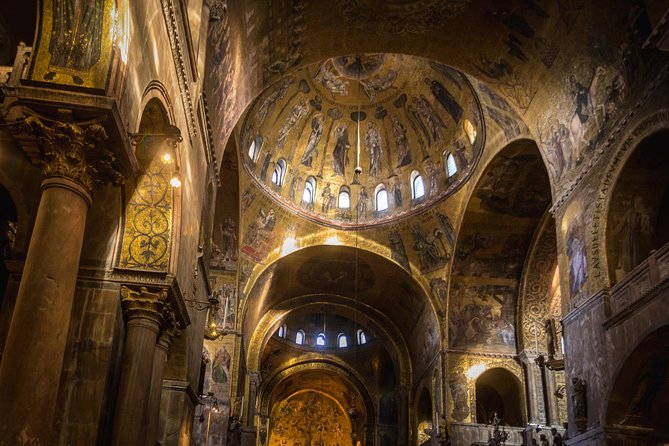 Venice's Best: Basilica, Doge's Palace, Gondola & History Gallery - A shared gondola through Venice’s canals